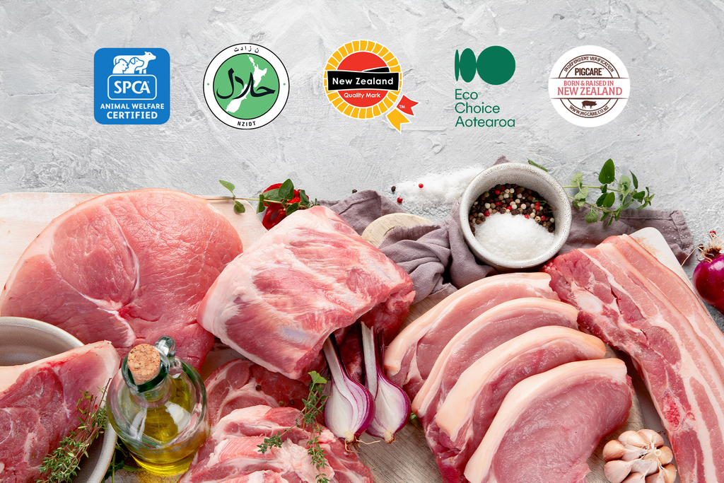 A table showcasing a variety of meat with labels and certification banners for authenticity and identification purposes.